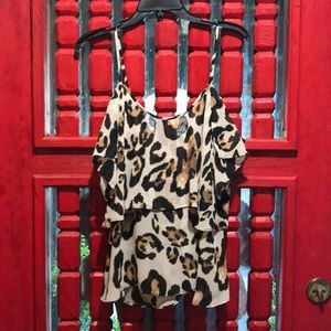 MuMu leopard print cold shoulder top.